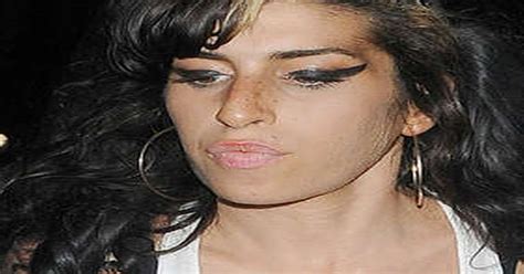 amy winehouse nip slip|Amy Winehouse strips for a breast cancer awareness image